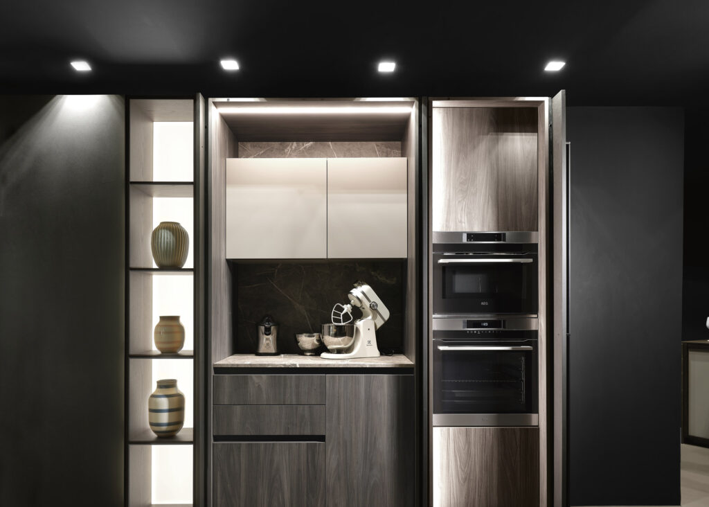 Luxury kitchen cabinet system with integrated lighting.