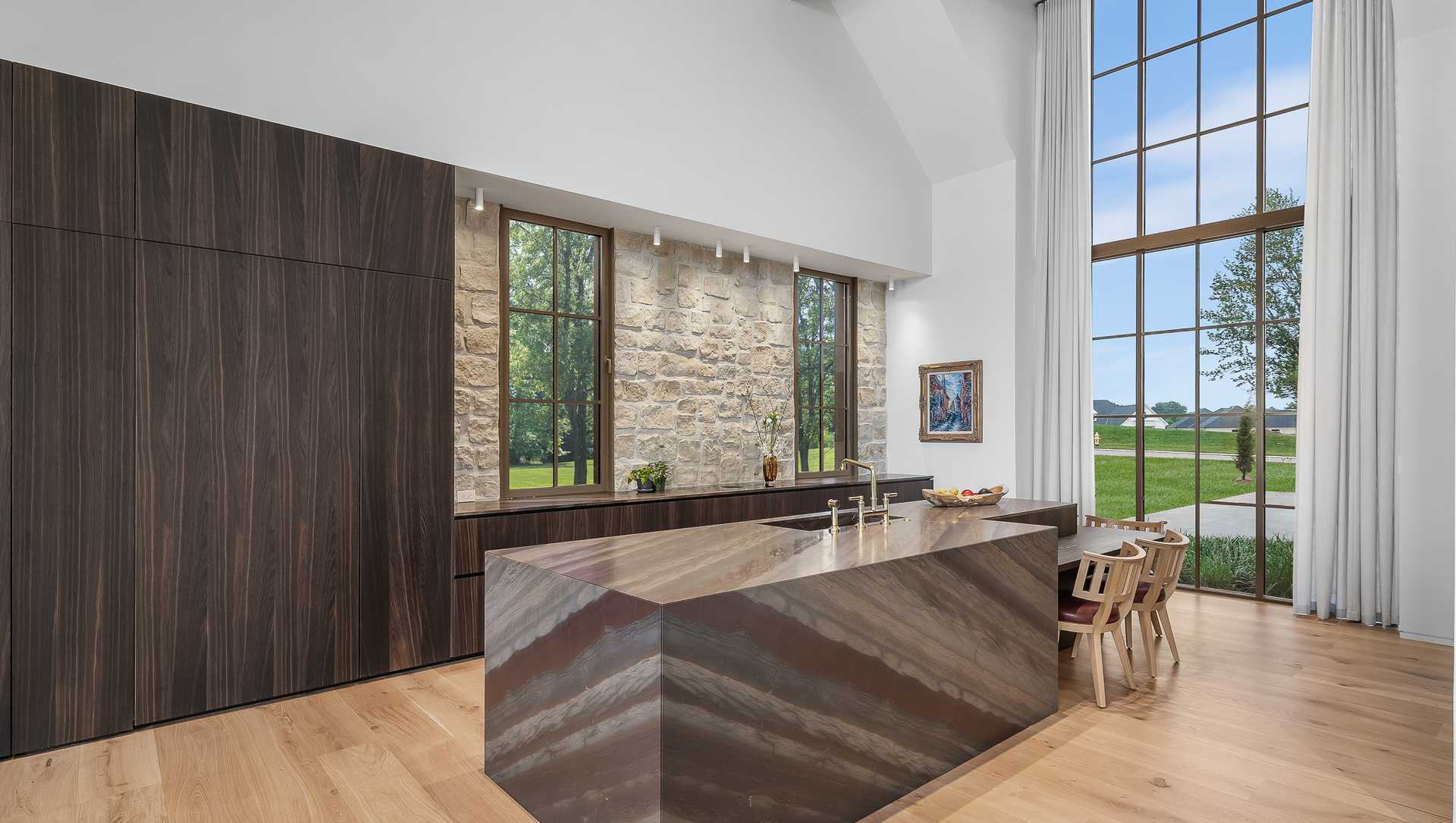 Modern Farmhouse Kitchen with Monolithic Quartzite Kitchen Island