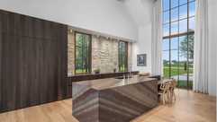 Modern Farmhouse Kitchen with Monolithic Quartzite Kitchen Island